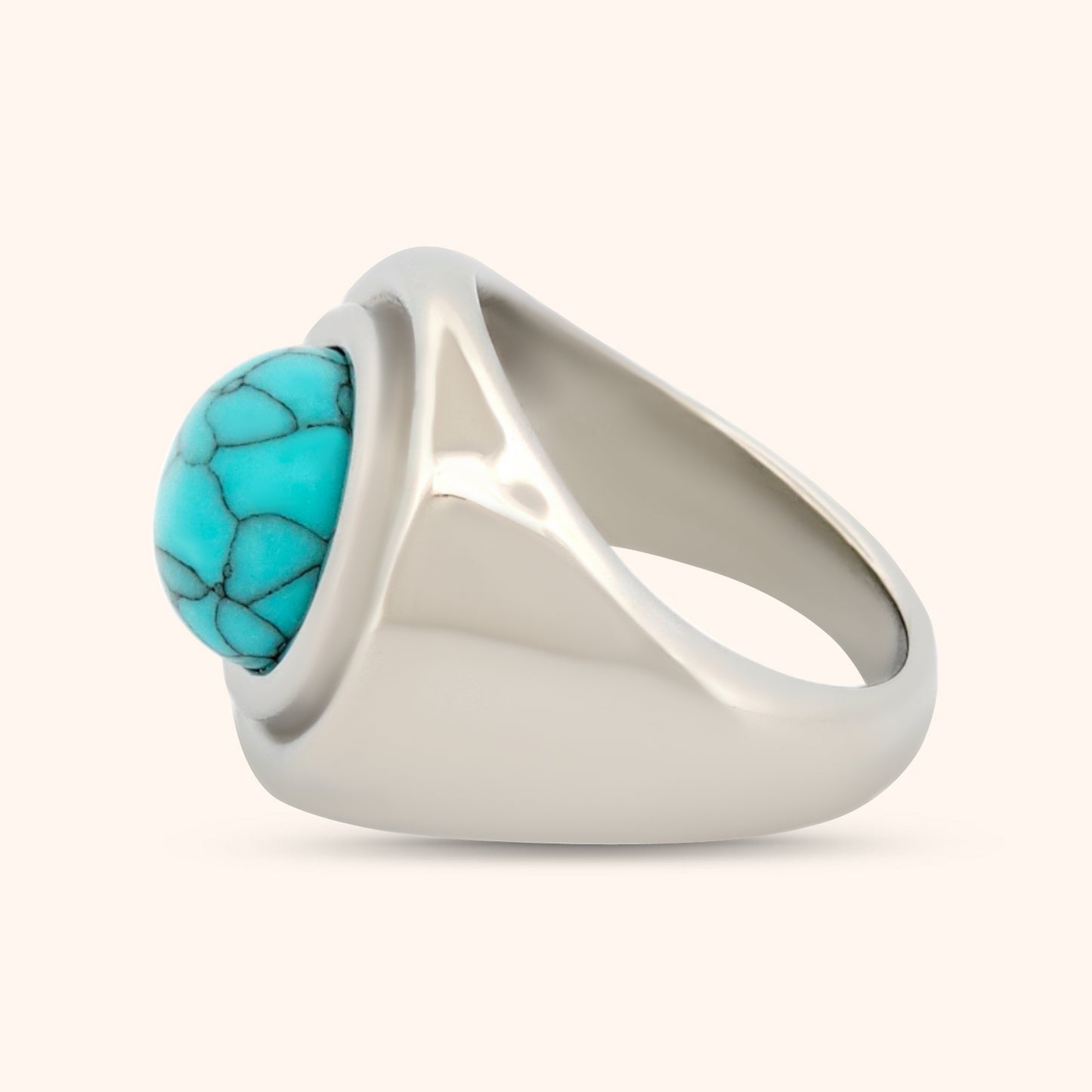 Angled view of the Morocco Ring, highlighting the sleek white gold band and the vibrant blue turquoise dome centerpiece.