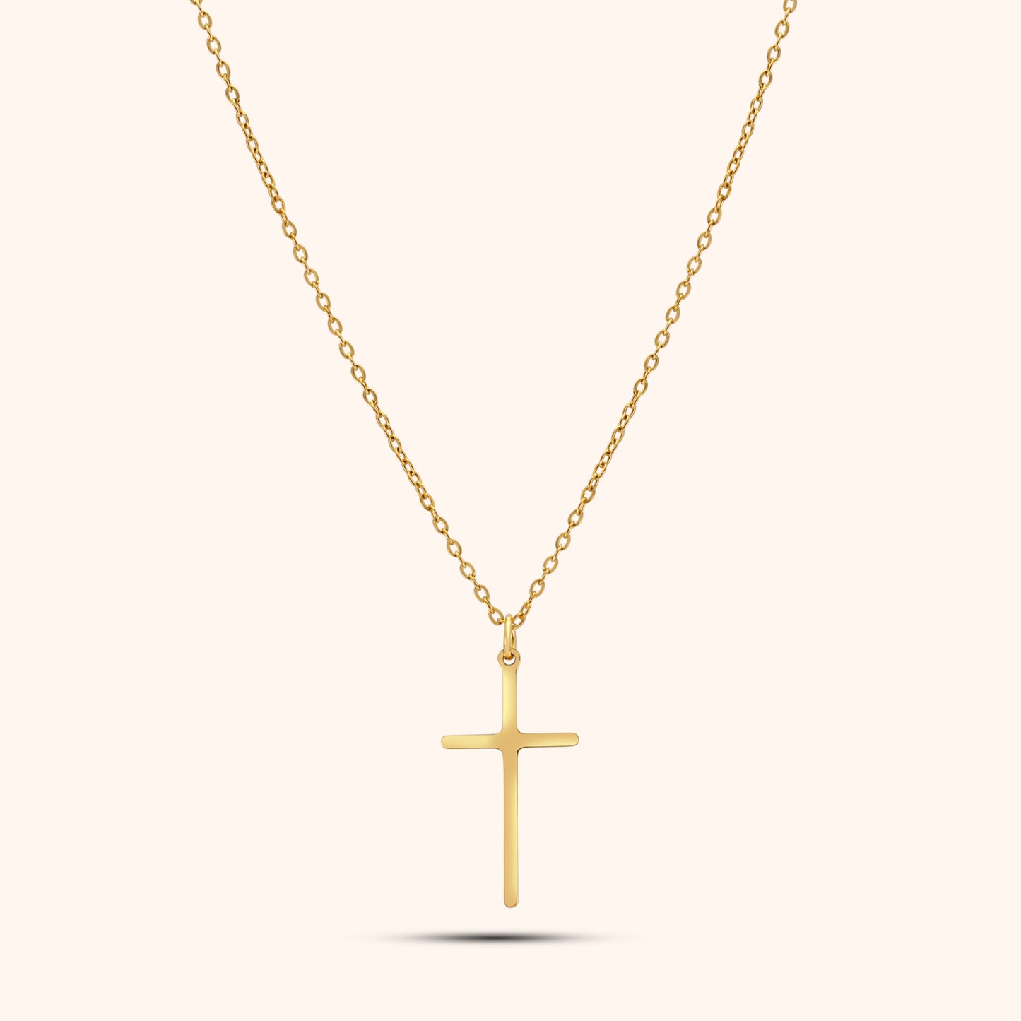 Pressie Dainty But Elegant Cross Charm Necklace, 18K gold plated stainless steel, showcasing the delicate cross charm and trace chain.