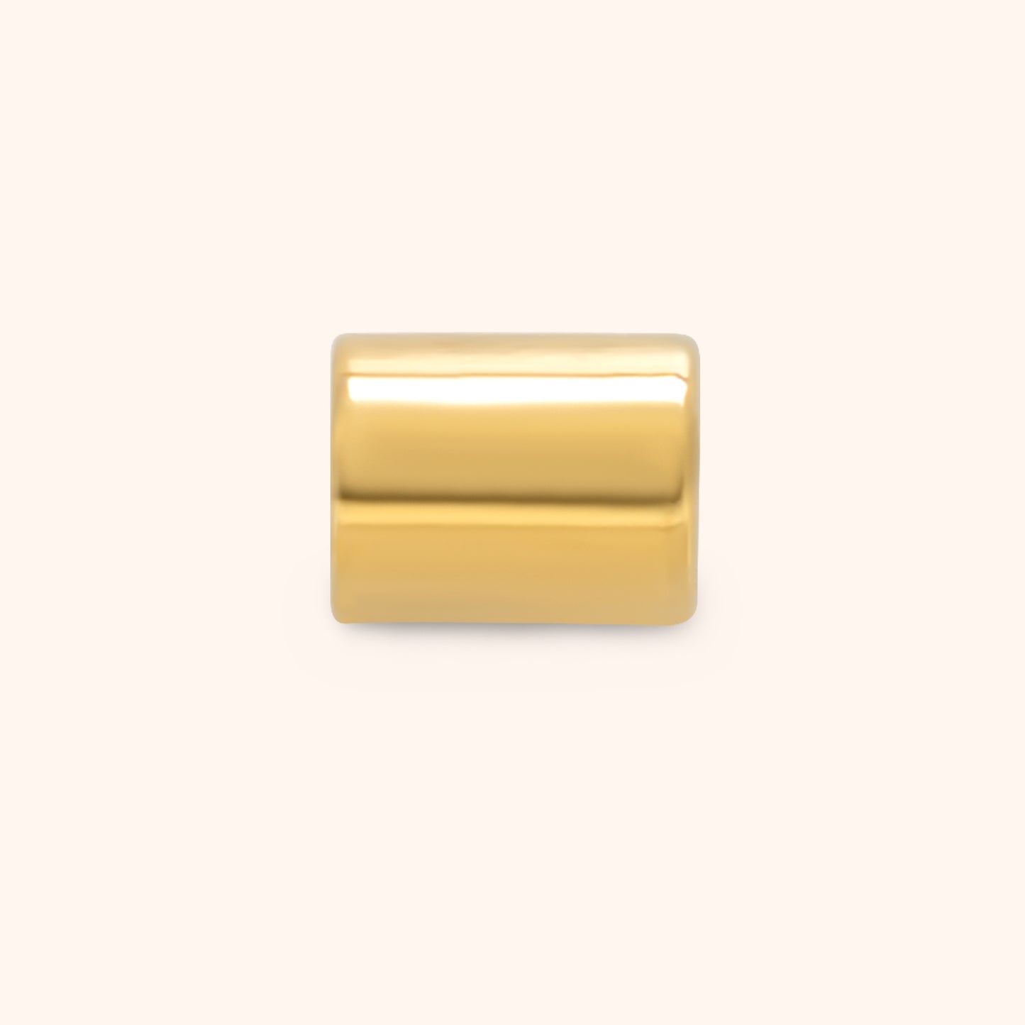 PRESSIE Gleam Spacer Bead; a single, smooth, polished 18k gold plated cylindrical tube bead for charm necklaces.