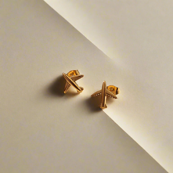 Gold-Tone Airplane Stud Earrings – A Wanderlust-Inspired Piece