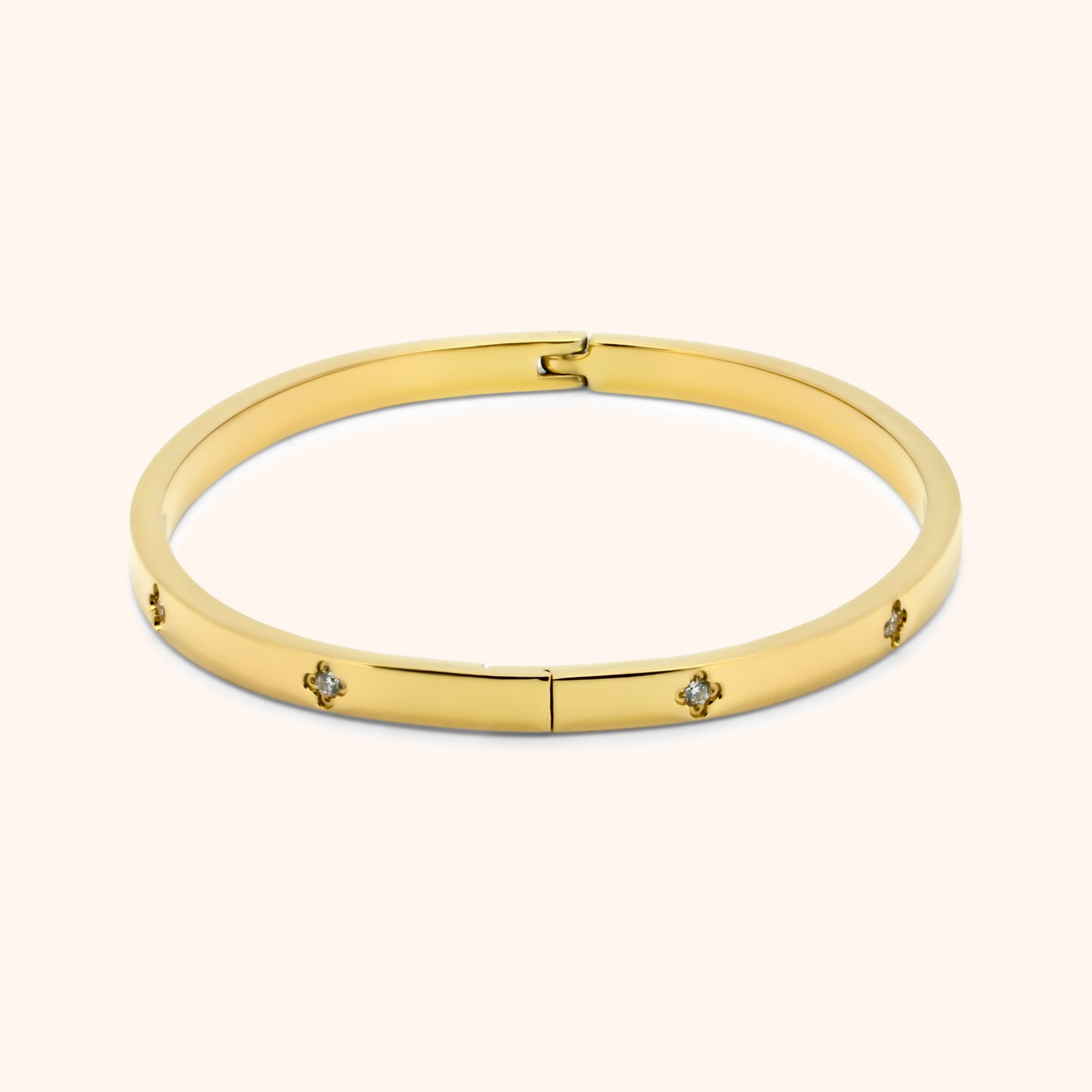 Gold clover bangle bracelet with clasp and crystal clover pattern