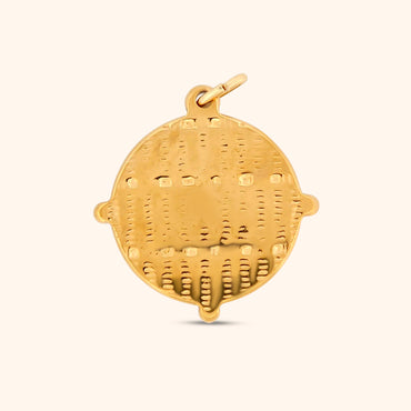 Rear view of the Andes Charm, showcasing the texture on the circular charm.