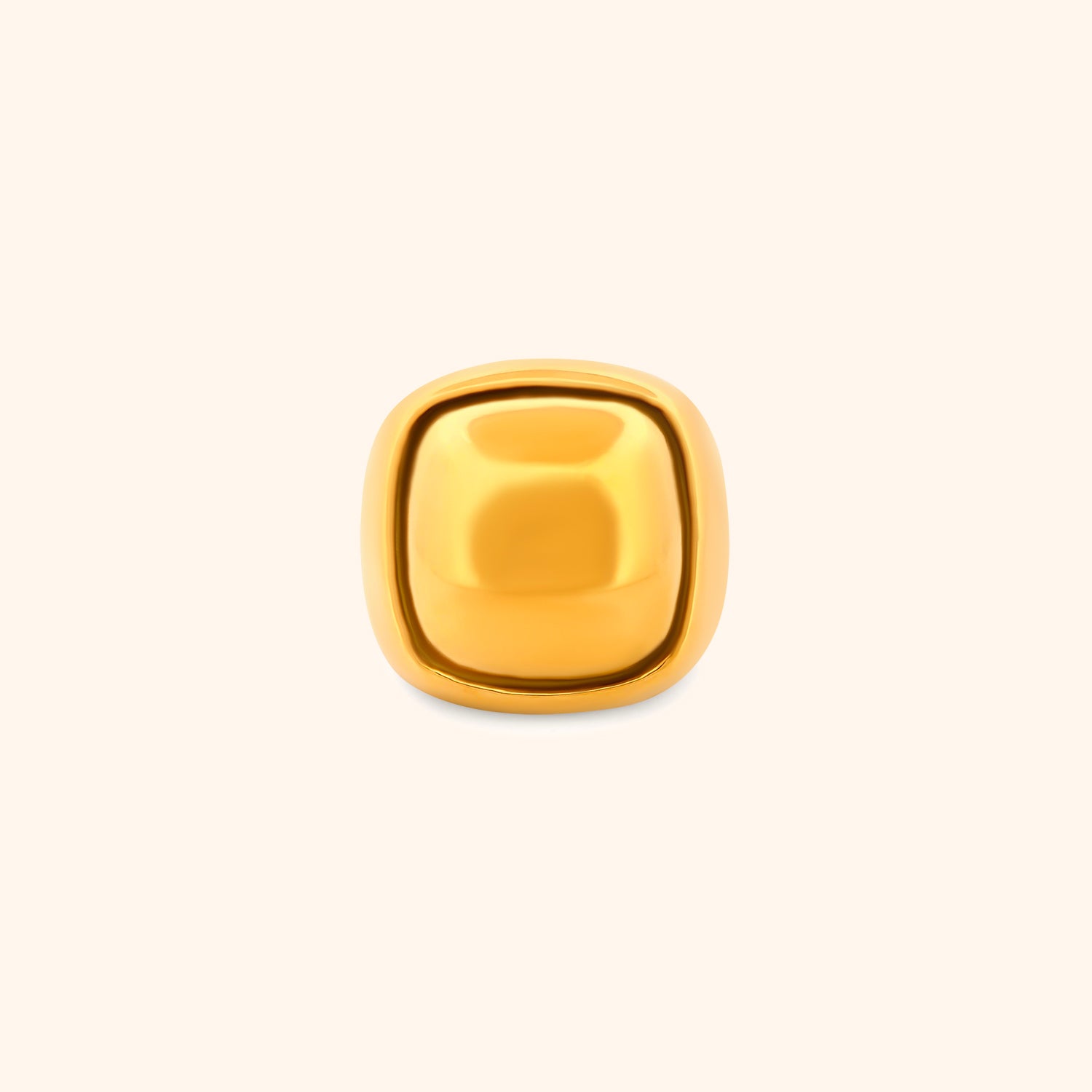 Close-up of the Zenith Ring, a gold square dome ring with a polished, smooth surface.