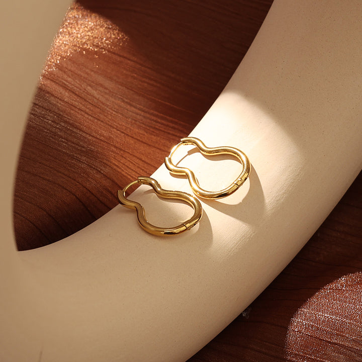 Gold Squiggle Huggie Earrings