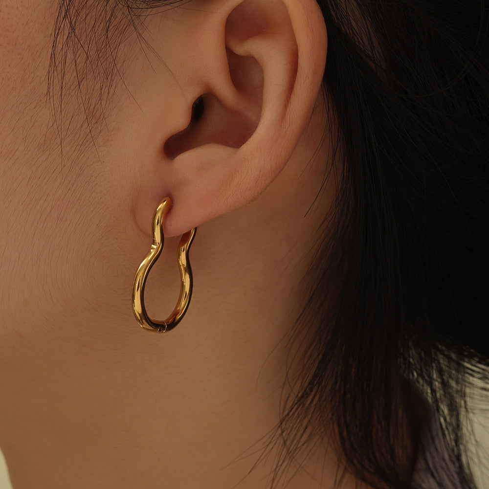 Gold Squiggle Huggie Earrings