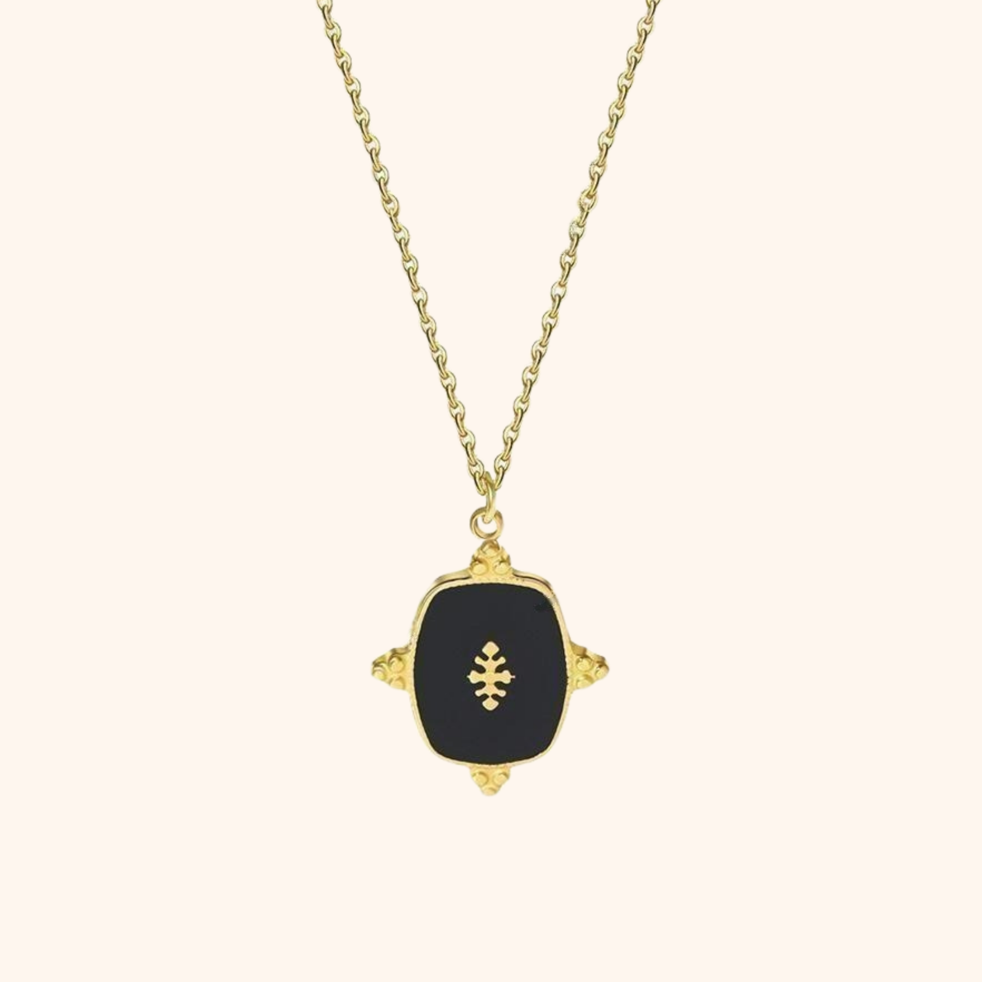 18k gold plated pendant necklace with black enamel and embossed emblem detail