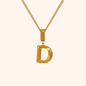 D initial necklace in gold with pearl charm on chain