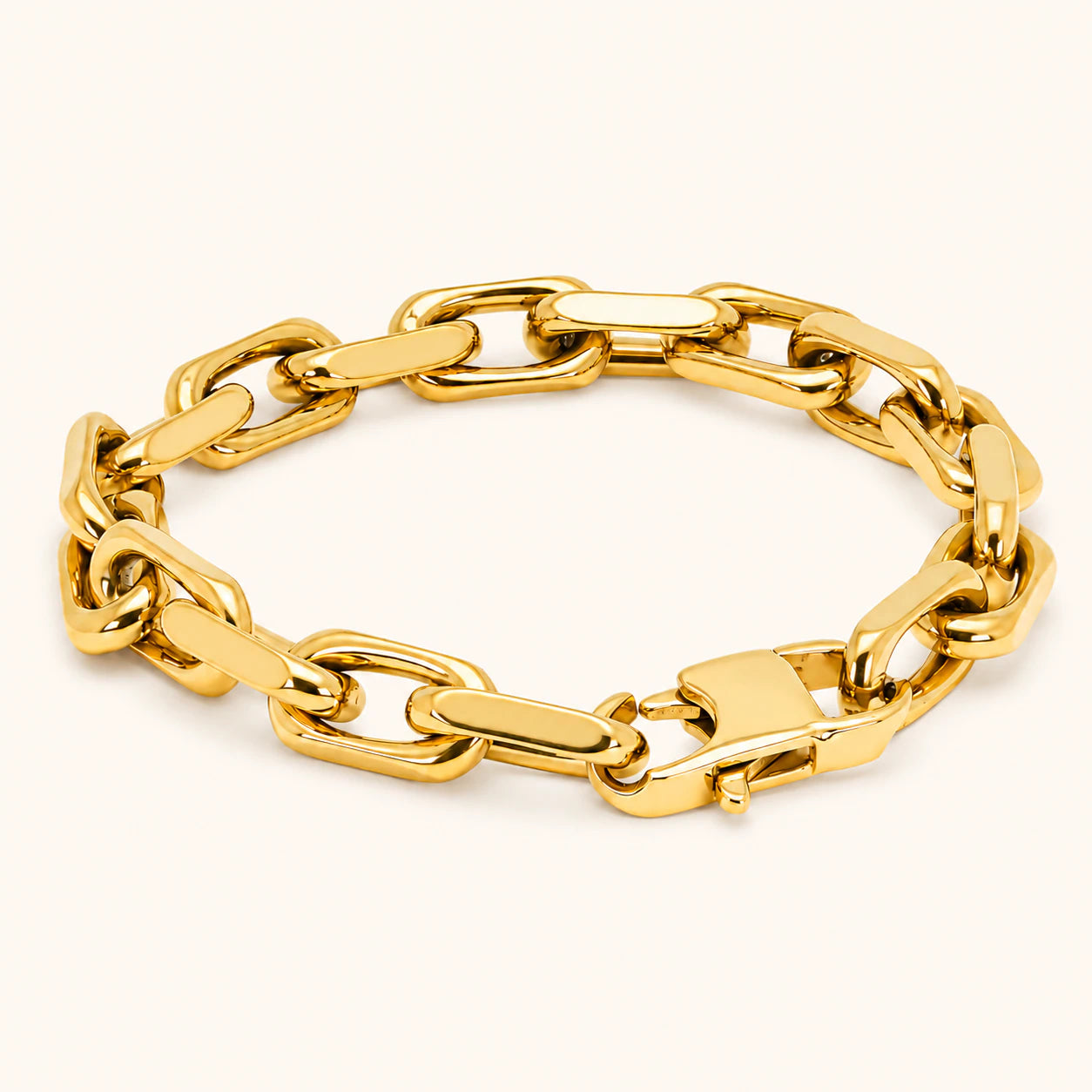 Gold chain bracelet on a white background