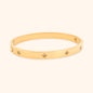 The Starry Night Bangle Bracelet, highlighting its elegant design with celestial star charms and sparkling crystals, perfect for adding a touch of celestial charm to any outfit.