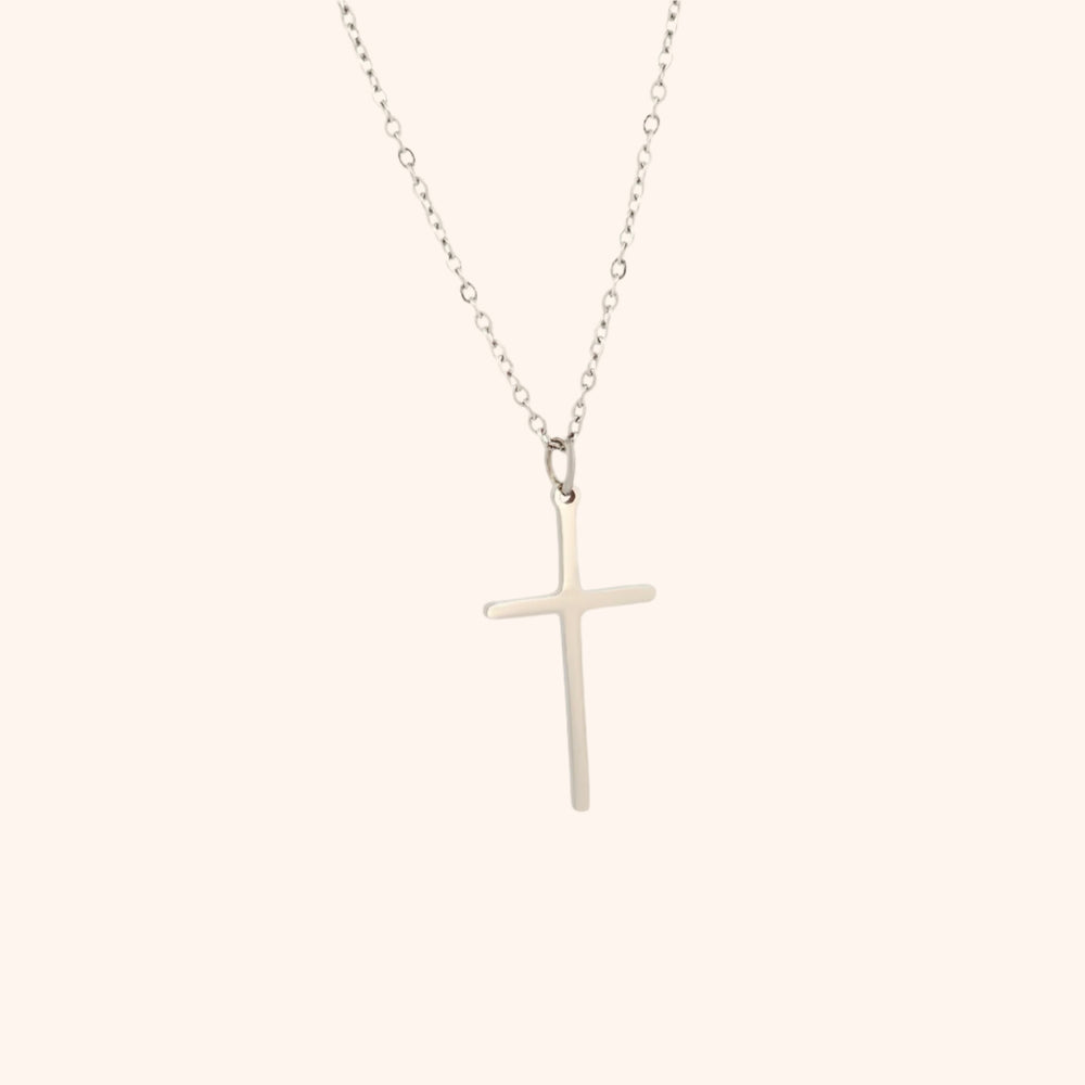 Pressie Dainty But Elegant Cross Charm Necklace, 18K gold plated stainless steel, lifestyle shot, perfect for everyday wear.