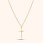 Pressie Dainty But Elegant Cross Charm Necklace, 18K gold plated stainless steel, showcasing the delicate cross charm and trace chain.