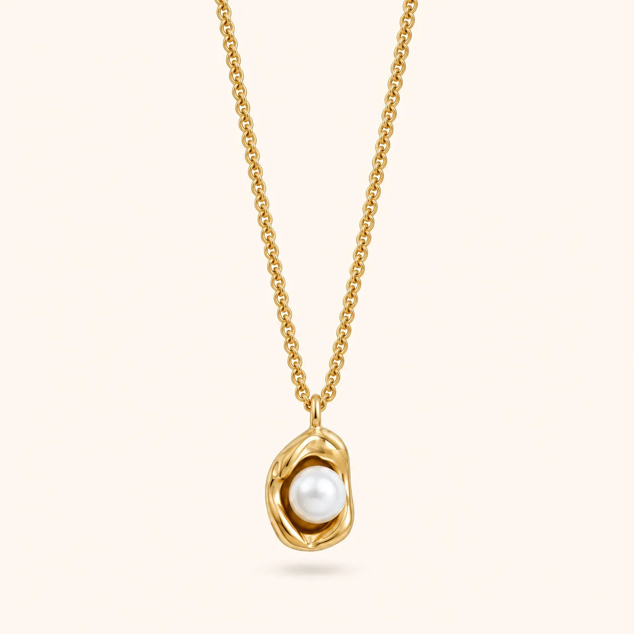 Silver pendant with a blue gemstone on a white background