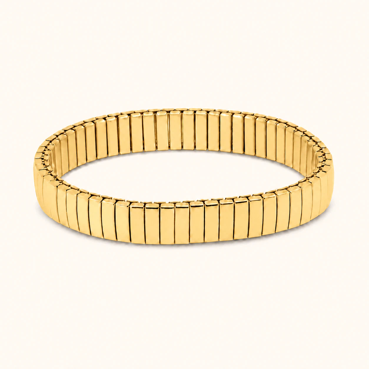 Gold bracelet on a white background