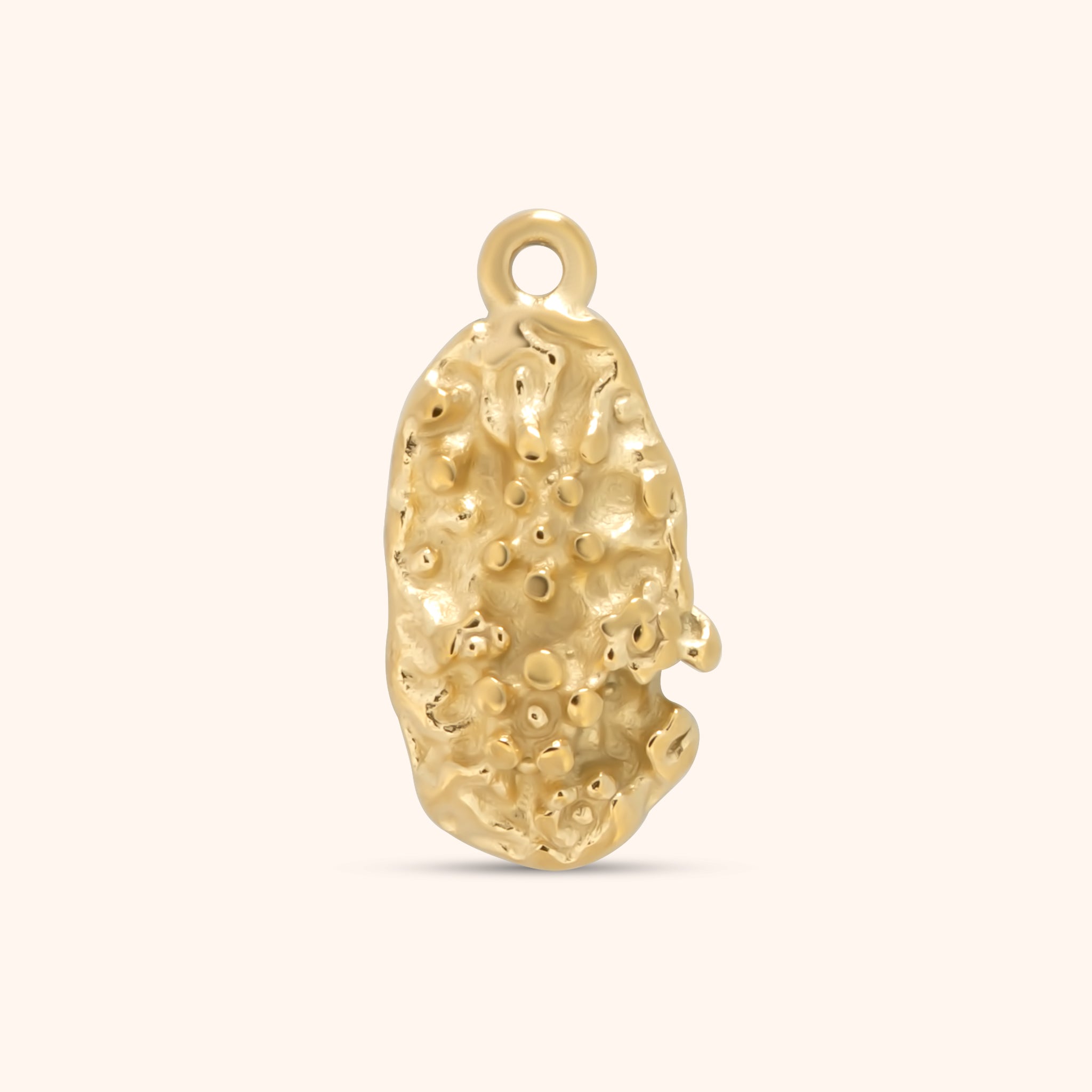 Gold nugget-style charm with irregular organic shape and textured surface, made of 18k gold plated stainless steel