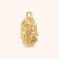 Gold nugget-style charm with irregular organic shape and textured surface, made of 18k gold plated stainless steel