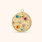 Round gold charm with raised bubble texture and colorful inset crystals in blue, orange, green, pink, and purple, featuring a top loop for attachment