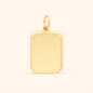Rectangular gold charm with rounded corners and ribbed edge detailing, made of 18k gold plated stainless steel with polished finish