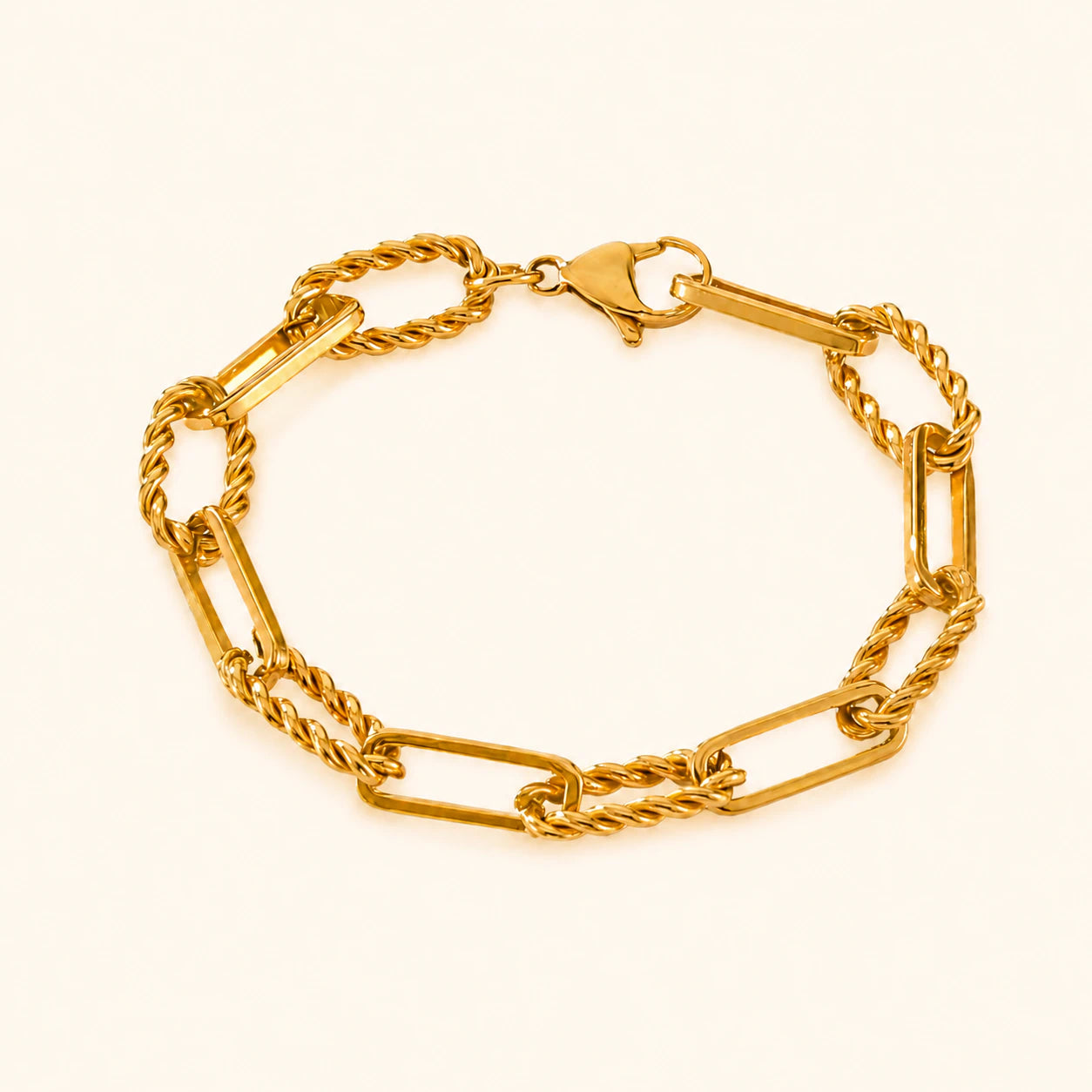 Gold chain bracelet on a white background