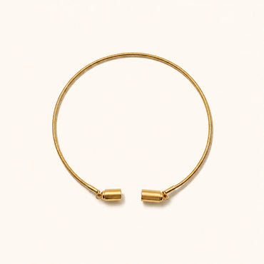 Gold bracelet on a white background
