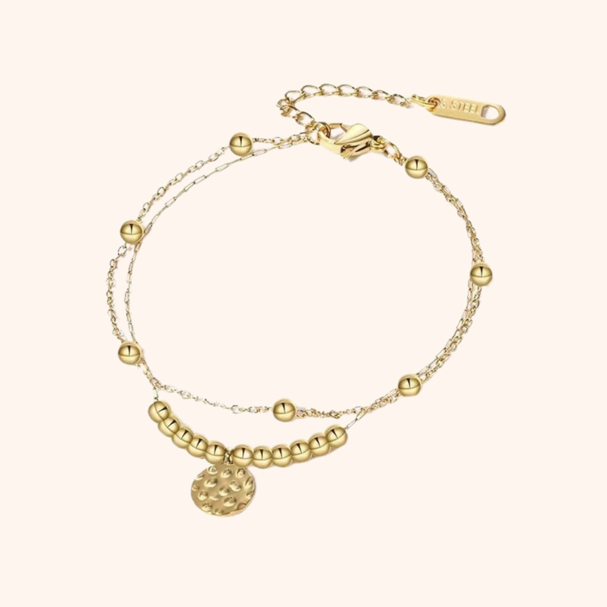 18k gold double-layer bracelet with beaded detailing and round textured charm